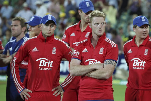 Dejected England players Joe Root, left, and Ben Stokes, right, after losing to Australia at their One Day International cricket match in Adelaide, Australia, Sunday Jan. 26, 2014.(AP Photo/James Elsby) Dejected England players Joe Root, left, and Ben Stokes, right, after losing to Australia at their One Day International cricket match in Adelaide, Australia, Sunday Jan. 26, 2014.(AP Photo/James Elsby)