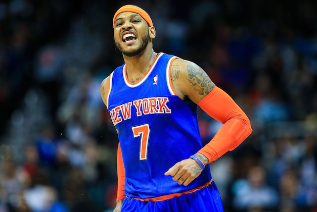Feb 22, 2014; Atlanta, GA, USA; New York Knicks small forward Carmelo Anthony (7) celebrates after shooting a three in the second half against the Atlanta Hawks at Philips Arena. The Hawks won 107-98. Mandatory Credit: Daniel Shirey-USA TODAY Sports