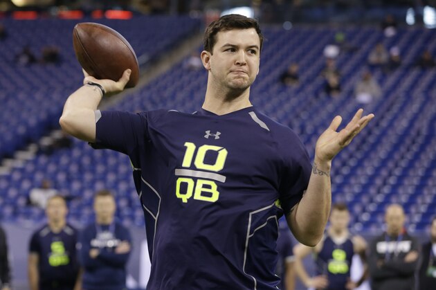 Alabama quarterback AJ McCarron throws during a drill at the NFL football scouting combine in Indianapolis, Sunday, Feb. 23, 2014. (AP Photo/Michael Conroy)