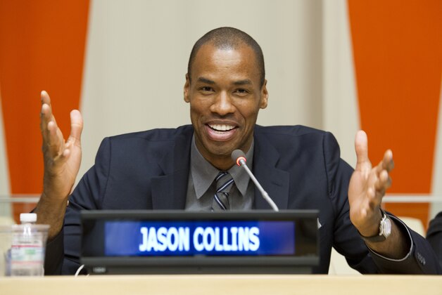 In this photo provided by the United Nations, former NBA player Jason Collins addresses the media during a news conference at United Nations headquarters, Tuesday, Dec. 10, 2013. Collins and former tennis great Martina Navratilova appeared at the U.N. to urge world sports bodies like the International Olympic Committee and FIFA to do more to support gay athletes during a special event celebrating International Human Rights Day. (AP photo/The United Nations, Eskinder Debebe)