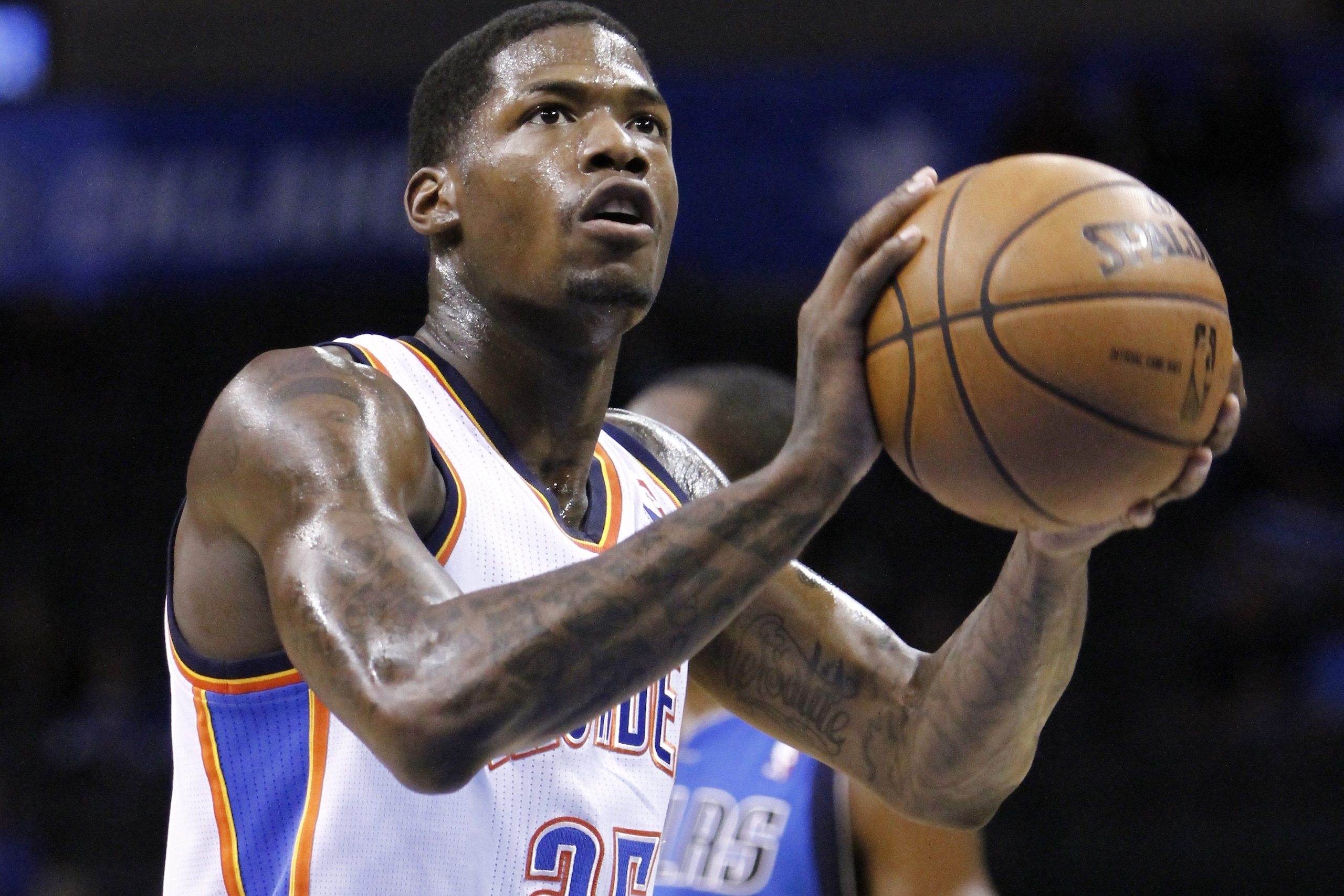 Oklahoma City Thunder guard DeAndre Liggins shoots a free throw against the Dallas Mavericks during the fourth quarter of an NBA basketball game in Oklahoma City, Monday, Feb. 4, 2013.  Oklahoma City won 112-91.  (AP Photo/Alonzo Adams)
