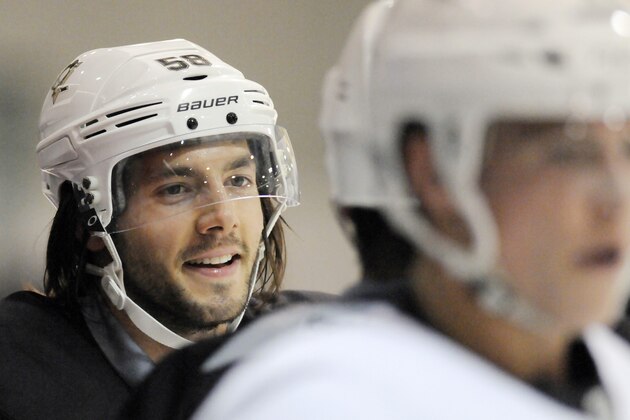 **ADVANCE FOR SEPT. 30** Pittsburgh Penguins Kris Letang (58) watches teammates during NHL hockey training camp on Friday, Sept. 27, 2013, in West Point, N.Y. (AP Photo/Hans Pennink)