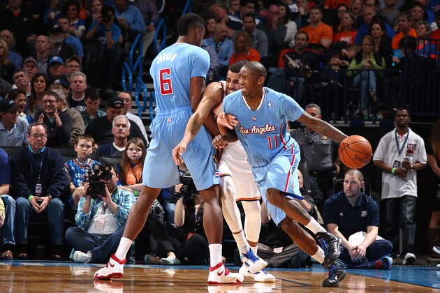 OKLAHOMA CITY, OK - FEBRUARY 23: Jamal Crawford #11 of the Los Angeles Clippers drives during a game at Chesapeake Energy Arena on February 23, 2014 in Oklahoma City, Oklahoma. NOTE TO USER: User expressly acknowledges and agrees that, by downloading and/or using this photograph, user is consenting to the terms and conditions of the Getty Images License Agreement.  Mandatory Copyright Notice: Copyright 2014 NBAE (Photo by Nathaniel S. Butler/NBAE via Getty Images)