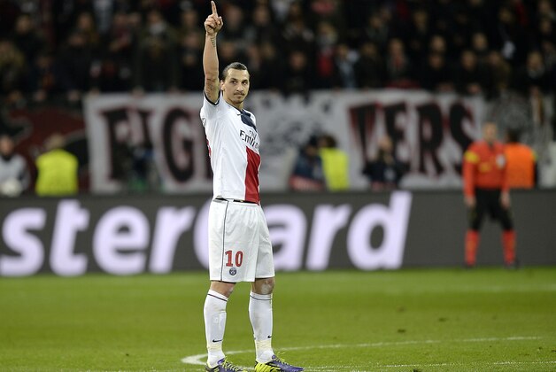 PSG's Zlatan Ibrahimovic celebrates his side's second goal during a Champions League round of the last 16 first leg soccer match between Bayer Leverkusen and Paris Saint-Germain in Leverkusen, Germany, Tuesday Feb. 18, 2014.  (AP Photo/Martin Meissner)