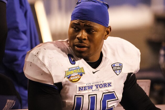 Buffalo linebacker Khalil Mack (46) talks to a teammate during the second half of the Famous Idaho Potato Bowl NCAA college football game against San Diego State in Boise, Idaho, on Saturday, Dec. 21, 2013. San Diego State defeated Buffalo 49-24. (AP Photo/Otto Kitsinger)