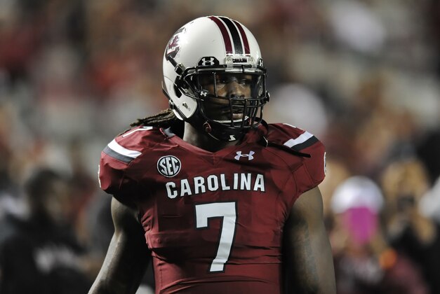 South Carolina's Jadeveon Clowney warms up before the start of an NCAA college football game against Florida Saturday, Nov. 16, 2013, at Williams-Brice Stadium in Columbia, S.C. (AP Photo/ Richard Shiro)