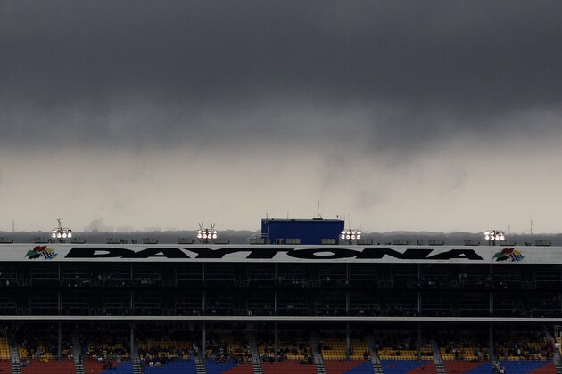 DAYTONA BEACH, FL - FEBRUARY 23:  Rain falls during a delay in the NASCAR Sprint Cup Series Daytona 500 at Daytona International Speedway on February 23, 2014 in Daytona Beach, Florida.  (Photo by Brian Lawdermilk/Getty Images)