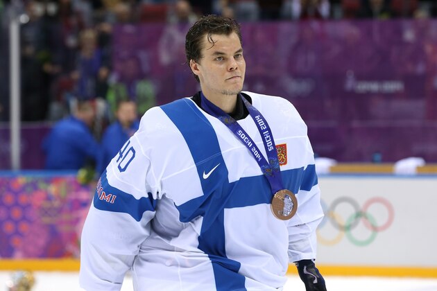 SOCHI, RUSSIA - FEBRUARY 22:  Bronze medalist Tuukka Rask #40 of Finland celebrates after defeating the United States 5-0 during the Men's Ice Hockey Bronze Medal Game on Day 15 of the 2014 Sochi Winter Olympics at Bolshoy Ice Dome on February 22, 2014 in Sochi, Russia.  (Photo by Bruce Bennett/Getty Images)
