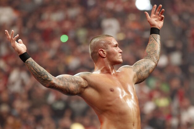 WWE Superstar Randy Orton celebrates victory during WrestleMania XXVI on March 28, 2010, at University of Phoenix Stadium in Glendale, Arizona. (AP Photo/Rick Scuteri)