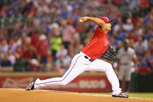 ARLINGTON, TX - SEPTEMBER 24:  Yu Darvish #11 of the Texas Rangers at Rangers Ballpark in Arlington on September 24, 2013 in Arlington, Texas.  (Photo by Ronald Martinez/Getty Images)