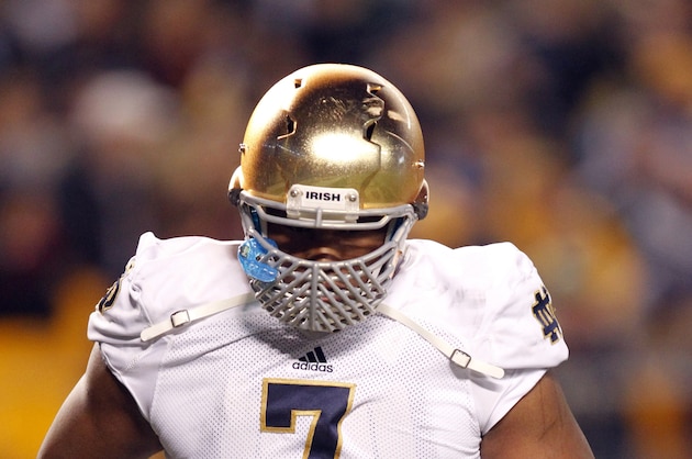 Nov 9, 2013; Pittsburgh, PA, USA; Notre Dame Fighting Irish defensive lineman Stephon Tuitt (7) leaves the field after being ejected from the game against the Pittsburgh Panthers during the second quarter at Heinz Field. Mandatory Credit: Charles LeClaire-USA TODAY Sports