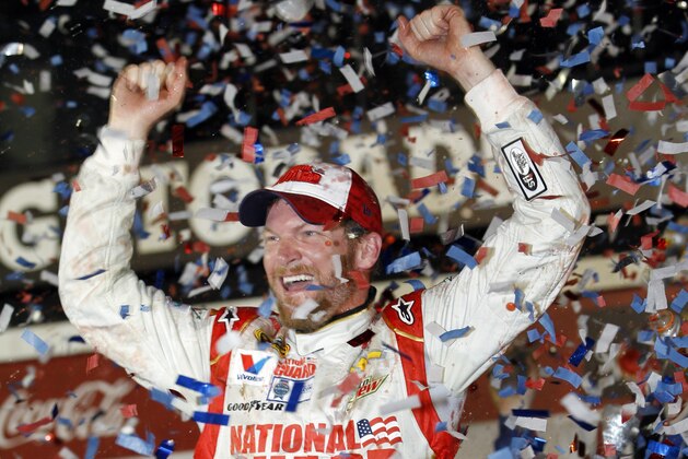 Dale Earnhardt Jr. celebrates in Victory Lane after winning the NASCAR Daytona 500 Sprint Cup series auto race at Daytona International Speedway in Daytona Beach, Fla., Sunday, Feb. 23, 2014. (AP Photo/Terry Renna)
