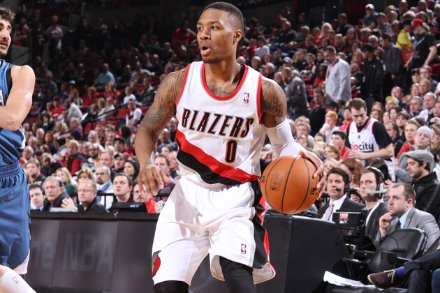 PORTLAND, OR - FEBRUARY 23:  Damian Lillard #0 of the Portland Trail Blazers handles the ball during a game against the Minnesota Timberwolves on February 23, 2014 at the Moda Center Arena in Portland, Oregon. NOTE TO USER: User expressly acknowledges and agrees that, by downloading and or using this photograph, user is consenting to the terms and conditions of the Getty Images License Agreement. Mandatory Copyright Notice: Copyright 2014 NBAE (Photo by Sam Forencich/NBAE via Getty Images)