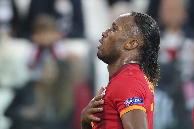 Galatasaray forward Didier Drogba, of Ivory Coast, celebrates after scoring during a Champions League, Group B, soccer match between Juventus and Galatasaray at the Juventus stadium in Turin, Italy, Wednesday, Oct. 2, 2013. (AP Photo/Antonio Calanni)