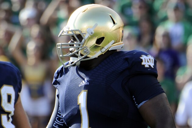 FILE - In this Aug. 31, 2013, file photo Notre Dame defensive lineman Louis Nix lines up during an NCAA college football game against Temple in South Bend, Ind.  Nix loves to have fun with people, so it's hard to tell how serious he is when he says he's considering returning for one more year. (AP Photo/Joe Raymond)