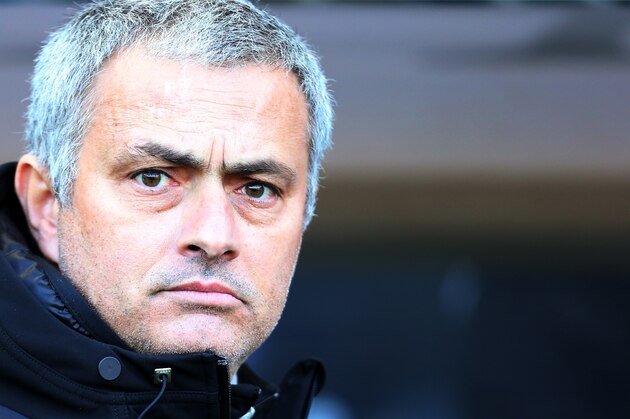 Chelsea's manager Jose Mourinho looks on ahead of their English Premier League soccer match against Hull City at the KC Stadium, Hull, England, Saturday, Jan. 11, 2014. (AP Photo/Scott Heppell)