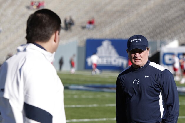 Penn State Interim head coach Tom Bradley, right, and Penn State assistant coach Jay Paterno during the first half of the TicketCity Bowl NCAA college football game, Monday, Jan. 2, 2012, at the Cotton Bowl in Dallas. Houston won 30-14. (AP Photo/Brandon Wade)