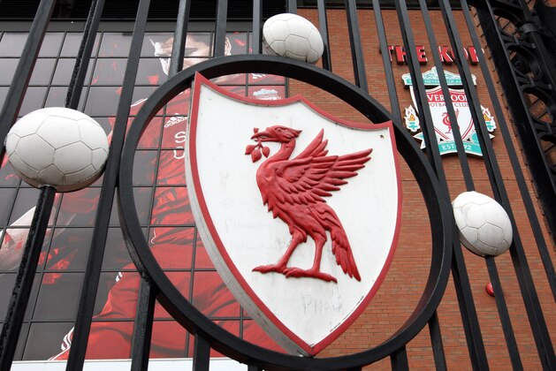 FILE -- The gates of Liverpool Football Club's Anfield Stadium in Liverpool, England, are seen in this Friday, Oct. 15, 2010 file photo. Liiverpool's principal owner has acknowledged that the English Premier League club might have to leave Anfield for a new stadium. John Henry's Fenway Sports Group has been considering stadium options since buying the club in October, and Henry says on Twitter that a move might be inevitable. Responding to a fan urging him to keep Liverpool at its home of 119 years, Henry says: