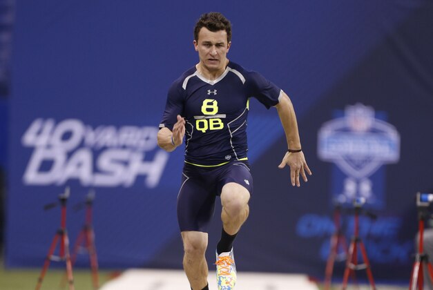 Feb 23, 2014; Indianapolis, IN, USA; Texas A&M quarterback Johnny Manziel runs the 40 yard dash during the 2014 NFL Combine at Lucas Oil Stadium. Mandatory Credit: Brian Spurlock-USA TODAY Sports