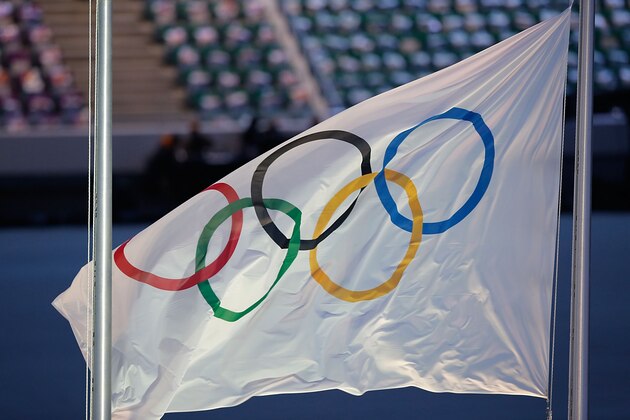 SOCHI, RUSSIA - FEBRUARY 23: The Olympic Flag waves as part of the 2014 Sochi Winter Olympics Closing Ceremony at Fisht Olympic Stadium on February 23, 2014 in Sochi, Russia.  (Photo by Joe Scarnici/Getty Images)