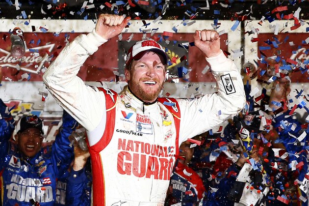 DAYTONA BEACH, FL - FEBRUARY 23:  Dale Earnhardt Jr., driver of the #88 National Guard Chevrolet, celebrates in Victory Lane after winning the NASCAR Sprint Cup Series Daytona 500 at Daytona International Speedway on February 23, 2014 in Daytona Beach, Florida.  (Photo by Tom Pennington/Getty Images)