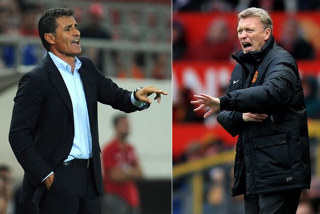 FILE PHOTO - EDITORS NOTE: COMPOSITE OF TWO IMAGES - Image Numbers 179655478 (L) and 454110679) In this composite image a comparison has been made between Olympiacos FC head coach Miguel Gonzalez (L) and David Moyes the Manchester United manager. Olympiakos and Manchester United meet in the UEFA Champions League Round of 16 with the first leg on Febuary 25, 2014 and the 2nd leg on March 19, 2014. ***LEFT IMAGE*** PIRAEUS, GREECE - AUGUST 25: Olympiacos FC head coach Miguel Gonzalez issues instructions during the greek Super League match between Olympiacos FC and Atromitos FC at Karaiskakis Stadium on August 25, 2013 in Piraeus, Greece. (Photo by Valerio Pennicino/Getty Images) ***RIGHT IMAGE*** MANCHESTER, ENGLAND - DECEMBER 07: David Moyes the Manchester United manager shouts instructions to his players during the Barclays Premier League match between Manchester United and Newcastle United at Old Trafford on December 7, 2013 in Manchester, England. (Photo by Richard Heathcote/Getty Images)