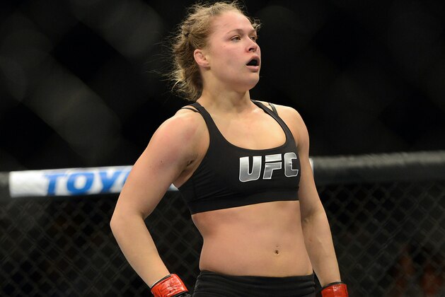 Dec 28, 2013; Las Vegas, NV, USA;   Ronda Rousey in the cage during her UFC Women's Bantamweight Championship Bout against Miesha Tate (not pictured) at the MGM Grand Garden Arena. Rousey won. Mandatory Credit: Jayne Kamin-Oncea-USA TODAY Sports