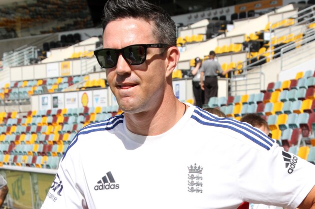 England's Kevin Pietersen arrives at the stadium ahead of his 100th test match during day 1 of the 1st test in the Ashes Series between England and Australia at the Gabba in Brisbane, Australia, Thursday, Nov. 21, 2013. (AP Photo/Tertius Pickard)
