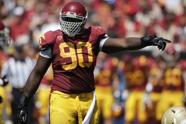 Southern California defensive end George Uko plays against Boston College during the first half of an NCAA college football game in Los Angeles, Saturday, Sept. 14, 2013. (AP Photo/Chris Carlson)