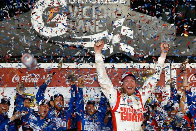 DAYTONA BEACH, FL - FEBRUARY 23:  Dale Earnhardt Jr., driver of the #88 National Guard Chevrolet, celebrates in Victory Lane after winning the NASCAR Sprint Cup Series Daytona 500 at Daytona International Speedway on February 23, 2014 in Daytona Beach, Florida.  (Photo by Tom Pennington/Getty Images)
