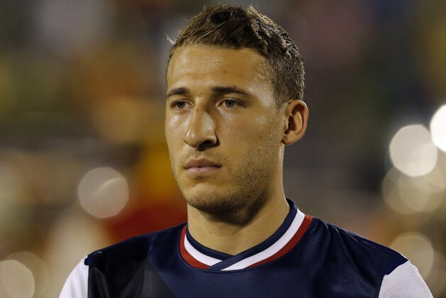 United States' Fabian Johnson listens the national anthems before the start of the 2014 World Cup qualifying soccer match against Jamaica in Kingston, Jamaica, Friday, June 7, 2013. (AP Photo/Andres Leighton) United States' Fabian Johnson listens the national anthems before the start of the 2014 World Cup qualifying soccer match against Jamaica in Kingston, Jamaica, Friday, June 7, 2013. (AP Photo/Andres Leighton)