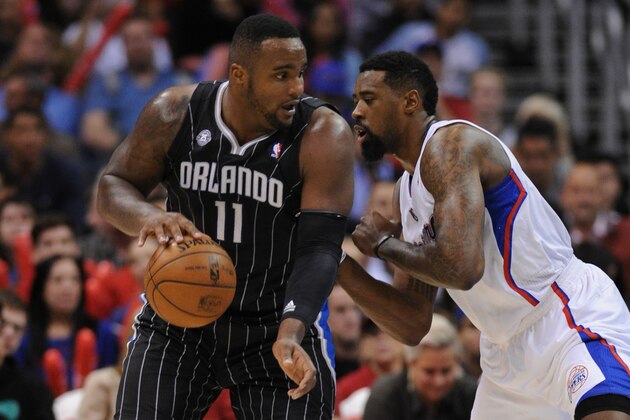 Jan 6, 2014; Los Angeles, CA, USA; Orlando Magic power forward Glen Davis (11) posts up Los Angeles Clippers center DeAndre Jordan (6) in the third quarter at Staples Center. The Clippers defeated the Magic 101-81. Mandatory Credit: Andrew Fielding-USA TODAY Sports