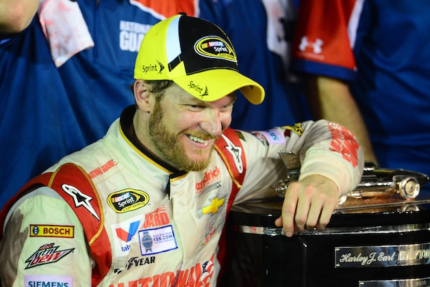 Feb 23, 2014; Daytona Beach, FL, USA; NASCAR Sprint Cup Series driver Dale Earnhardt Jr (88) celebrates in victory lane after winning the Daytona 500 at Daytona International Speedway. Mandatory Credit: Andrew Weber-USA TODAY Sports