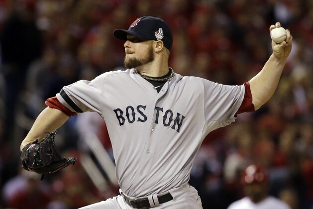 Boston Red Sox starting pitcher Jon Lester throws during the first inning of Game 5 of baseball's World Series against the St. Louis Cardinals Monday, Oct. 28, 2013, in St. Louis. (AP Photo/Jeff Roberson)