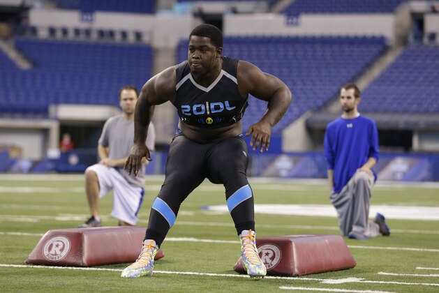 Florida State defensive lineman Timmy Jernigan runs a drill at the NFL football scouting combine in Indianapolis, Monday, Feb. 24, 2014. (AP Photo/Michael Conroy)