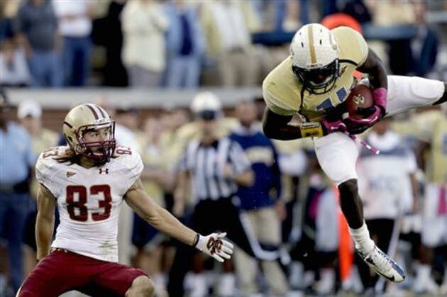 Boston College wide receiver Alex Amidon, left, watches as a pass intended for him is intercepted by Georgia Tech defensive back Jemea Thomas, right, in the fourth quarter of an NCAA college football game Saturday, Oct. 20, 2012, in Atlanta. (AP Photo/David Goldman)