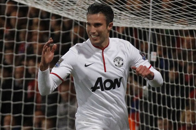 Manchester United's Robin Van Persie celebrates his penalty goal against Crystal Palace during their English Premier League soccer match at Selhurst Park, London, Saturday, Feb. 22, 2014. (AP Photo/Sang Tan)