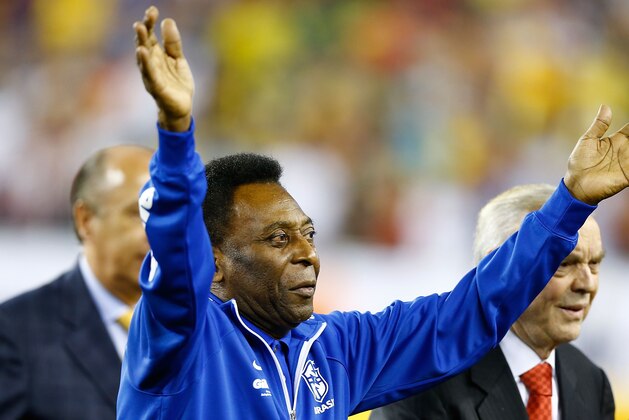 FOXBORO, MA - SEPTEMBER 10: Former Brazillian soccer player, Pele, waves to the crowd prior to the international friendly match between Brazil and Portugal at Gillette Stadium on September 10, 2013 in Foxboro, Massachusetts. (Photo by Jared Wickerham/Getty Images)