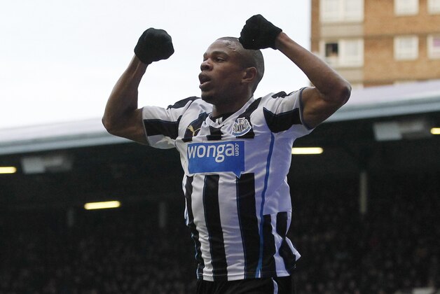 Newcastle United's Loic Remy celebrates his goal against  West Ham United during their English Premier League soccer match at Upton Park, London, Saturday, Jan. 18, 2014. (AP Photo/Sang Tan)