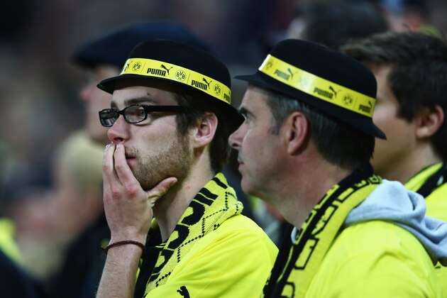 LONDON, ENGLAND - MAY 25:  Borussia Dortmund fans look despondent during the UEFA Champions League final match between Borussia Dortmund and FC Bayern Muenchen at Wembley Stadium on May 25, 2013 in London, United Kingdom.  (Photo by Alex Grimm/Getty Images)