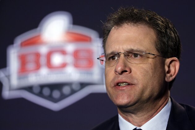 Auburn head coach Gus Malzahn answers a question during a news conference for the NCAA BCS National Championship college football game Sunday, Jan. 5, 2014, in Newport Beach, Calif. Florida State plays Auburn on Monday, Jan. 6, 2014. (AP Photo/David J. Phillip)