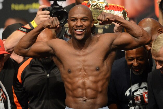 Sep 13, 2013; Las Vegas, NV, USA; Floyd Mayweather during his weight in at the MGM Grand Garden Arena for his super welterweight world championship fight against Canelo Alvarez (not pictured). Mandatory Credit: Jayne Kamin-Oncea-USA TODAY Sports