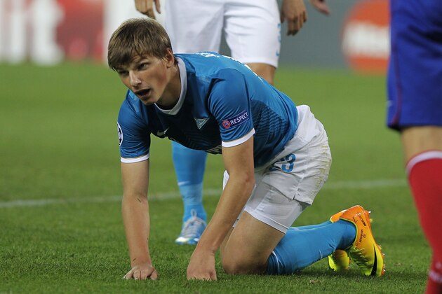 Zenit St Petersburg  Andrey Arshavin gets to his feet during a Group G Champions League soccer match against Atletico  Madrid at the Vicente Calderon stadium in Madrid, Wednesday, Sept. 18, 2013. (AP Photo/Andres Kudacki)