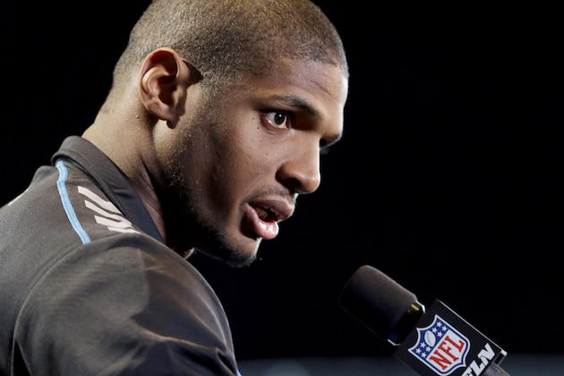 Missouri defensive end Michael Sam speaks during a news conference at the NFL football scouting combine in Indianapolis, Saturday, Feb. 22, 2014. (AP Photo/Nam Y. Huh)
