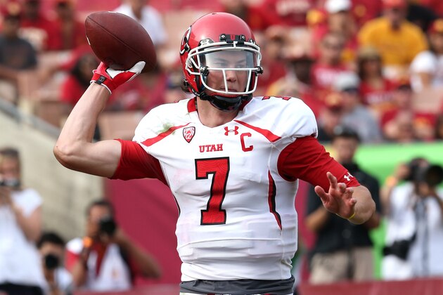 LOS ANGELES, CA - OCTOBER 26:  Quartrerback Travis Wilson #7 of the Utah Utes throws a pass against the USC Trojans at Los Angeles Coliseum on October 26, 2013 in Los Angeles, California.  USC won 19-3.  (Photo by Stephen Dunn/Getty Images)