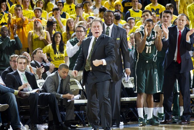 Michigan State head coach Tom Izzo reacts in the first half of an NCAA college basketball game against Michigan at Crisler Center in Ann Arbor, Mich., Sunday, Feb. 23, 2014. (AP Photo/Tony Ding)