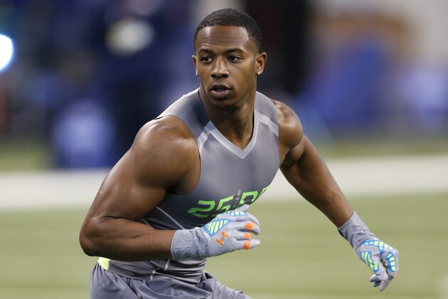 INDIANAPOLIS, IN - FEBRUARY 25: Former Oklahoma State defensive back Justin Gilbert runs a drill during the 2014 NFL Combine at Lucas Oil Stadium on February 25, 2014 in Indianapolis, Indiana. (Photo by Joe Robbins/Getty Images)
