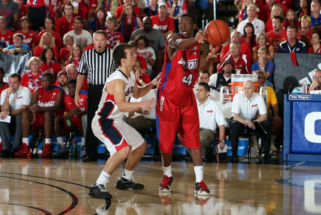 Nov 25, 2013; Maui, HI, USA; Gonzaga Bulldogs guard Kevin Pangos (4) defends Dayton Flyers guard Jordan Sibert (24) during the first round of the Maui Invitational at the Lahaina Civic Center. Dayton defeats Gonzaga 84-79. Mandatory Credit: Brian Spurlock-USA TODAY Sports