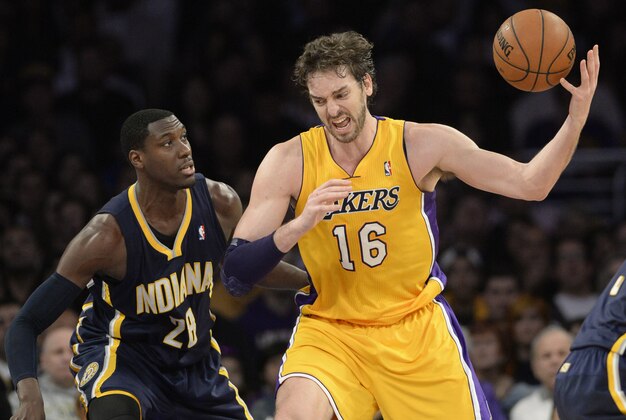 Jan 28, 2014; Los Angeles, CA, USA; Indiana Pacers center Ian Mahinmi (28) guards Los Angeles Lakers center Pau Gasol (16) during the second half at Staples Center. Mandatory Credit: Richard Mackson-USA TODAY Sports