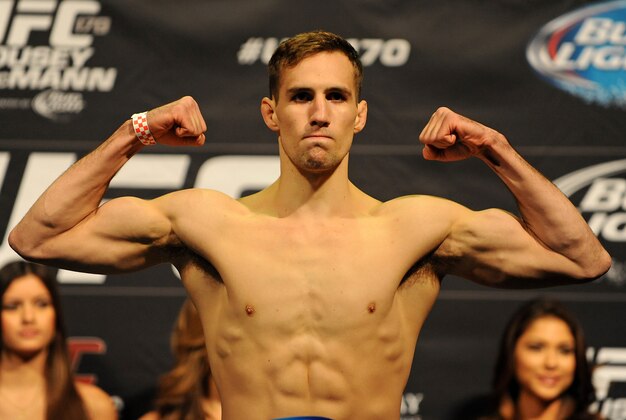 Feb 21, 2014; Las Vegas, NV, USA; UFC Welterweight Rory MacDonald participates in the UFC 170 weigh-in at Mandalay Bay Events Center. Mandatory Credit: Stephen R. Sylvanie-USA TODAY Sports